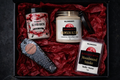 Halloween-themed candles and incense set in a decorative box with red tissue paper. Horror Wax Bars. Horror Bath Products. Spooky Wax Bars. Spooky Bath Products. 