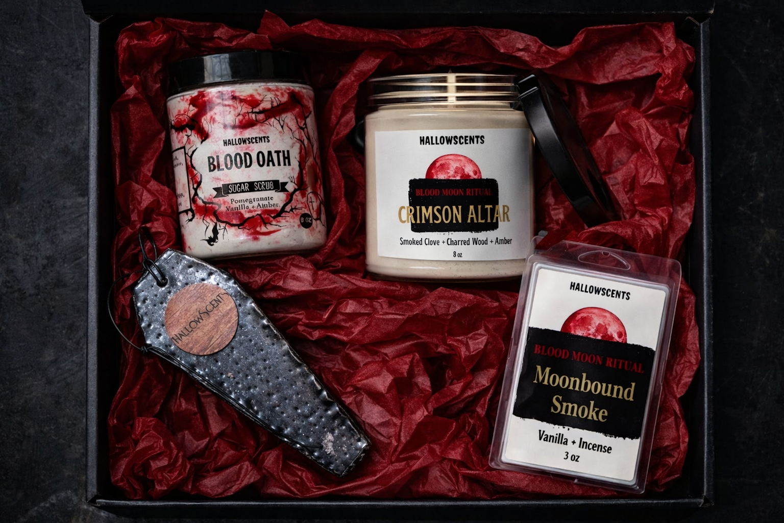 Halloween-themed candles and incense set in a decorative box with red tissue paper. Horror Wax Bars. Horror Bath Products. Spooky Wax Bars. Spooky Bath Products. 