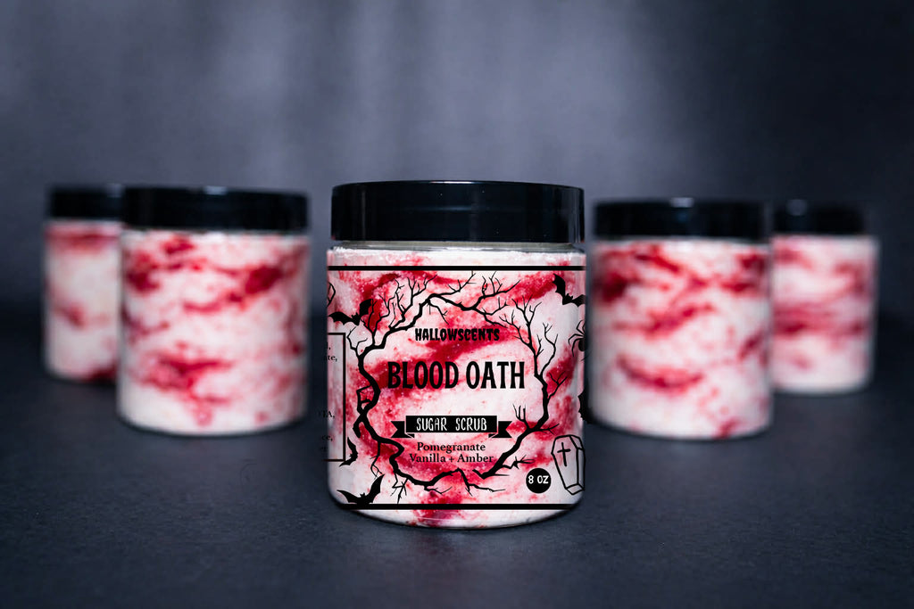 Jar labeled 'Blood Oath' with a red and white design on a dark background. Horror Wax Bars. Horror Bath Products. Spooky Wax Bars. Spooky Bath Products. 