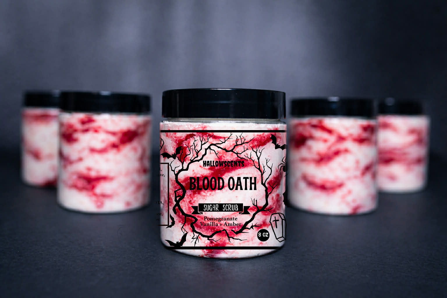 Jar labeled 'Blood Oath' with a red and white design on a dark background. Horror Wax Bars. Horror Bath Products. Spooky Wax Bars. Spooky Bath Products. 