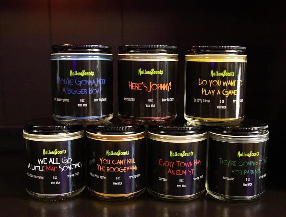Set of Halloween-themed candles with humorous text labels on a dark background. 
Horror Wax Bars. Horror Candles. Spooky Wax Bars. Horror Candles. Horror Bath and Body. Spooky bath and body. 