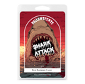 Packaging of Hallowscents Shark Attack candy with a shark illustration on a red background. Horror Wax Bars. Spooky Wax Bars. Horror Bath and Body. Spooky Bath and Body. 